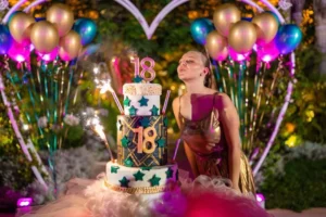 18th birthday celebration with balloons and a decorated cake