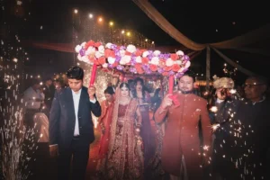 Wedding procession during a sparkler celebration