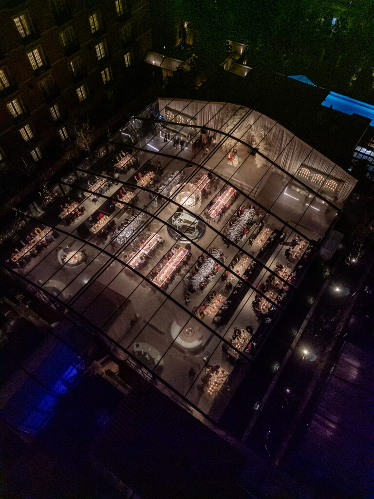 Night view of a clear-top event tent